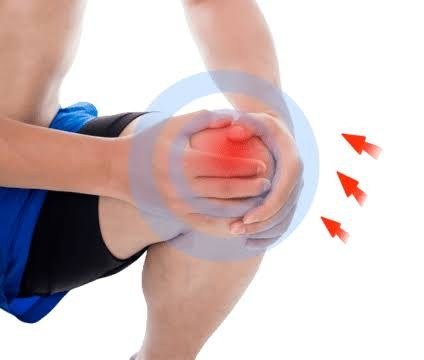 Person holding a knee